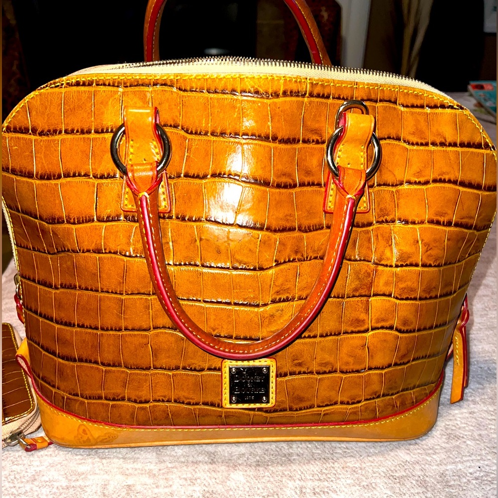 Vintage Dooney & Bourke Satchel-Normal wear and tear. Bag still in great shape.